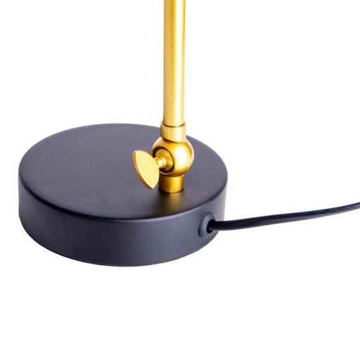 The "Triton" table lamp made of black and brass-colored metal is 42.5 cm high, has an E14 version and is ideal for living room, hallway, office or dessert