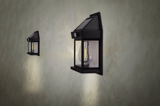 2 Set solar wall lamp "Mira" approx. 17 cm high, made of black weatherproof plastic, integrated LED in warm white, including motion detector and twilight sensor