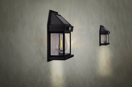 2 Set solar wall lamp "Mira" approx. 17 cm high, made of black weatherproof plastic, integrated LED in warm white, including motion detector and twilight sensor