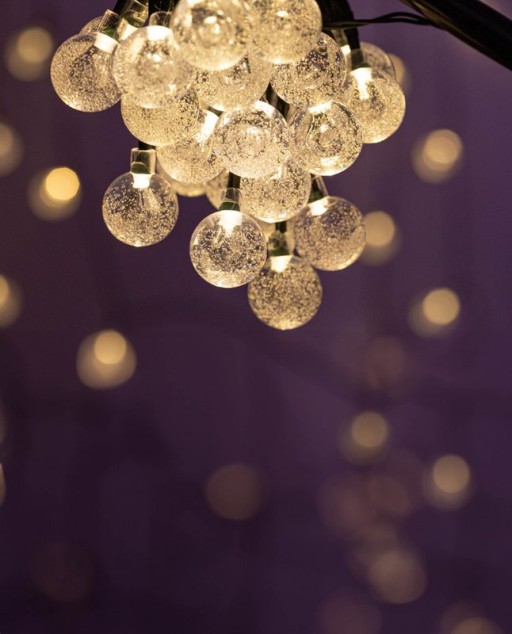 Outdoor light chain with decorative balls in glass look, 868 cm long, warm white,